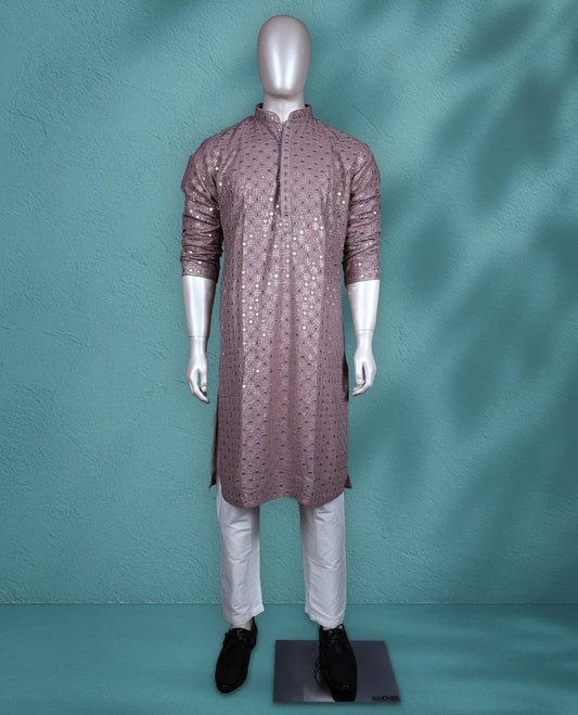 Dark onion colour georgette kurta set featuring thread and sequin work on the body, full sleeves, and paired with a matching bottom.