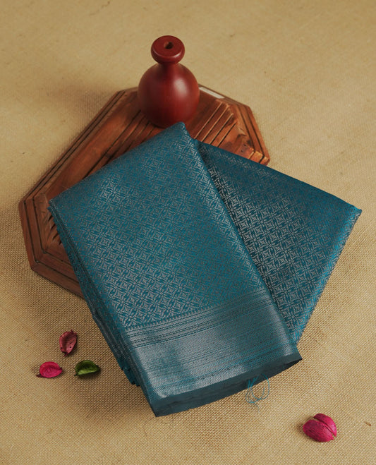 Aqua blue colour semi silk saree featuring neem zari Brocade Pattern all over the body, complemented by a Self Colour woven border with detailing, Pallu & blouse.