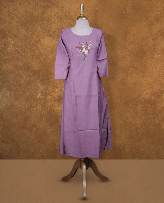 Lavender colour kurti with multicolour floral thread pattern, knee length design, styled with a round neckline and a  sleeve .