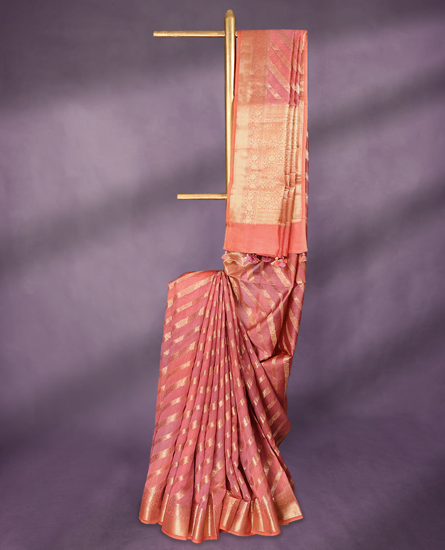 Onion Pink colour pure Banarasi Chanderi cotton, beautifully enhanced with hand-brushed colour and traditional antique zari Aada Design across the body, paired with traditional border and a matching blouse.