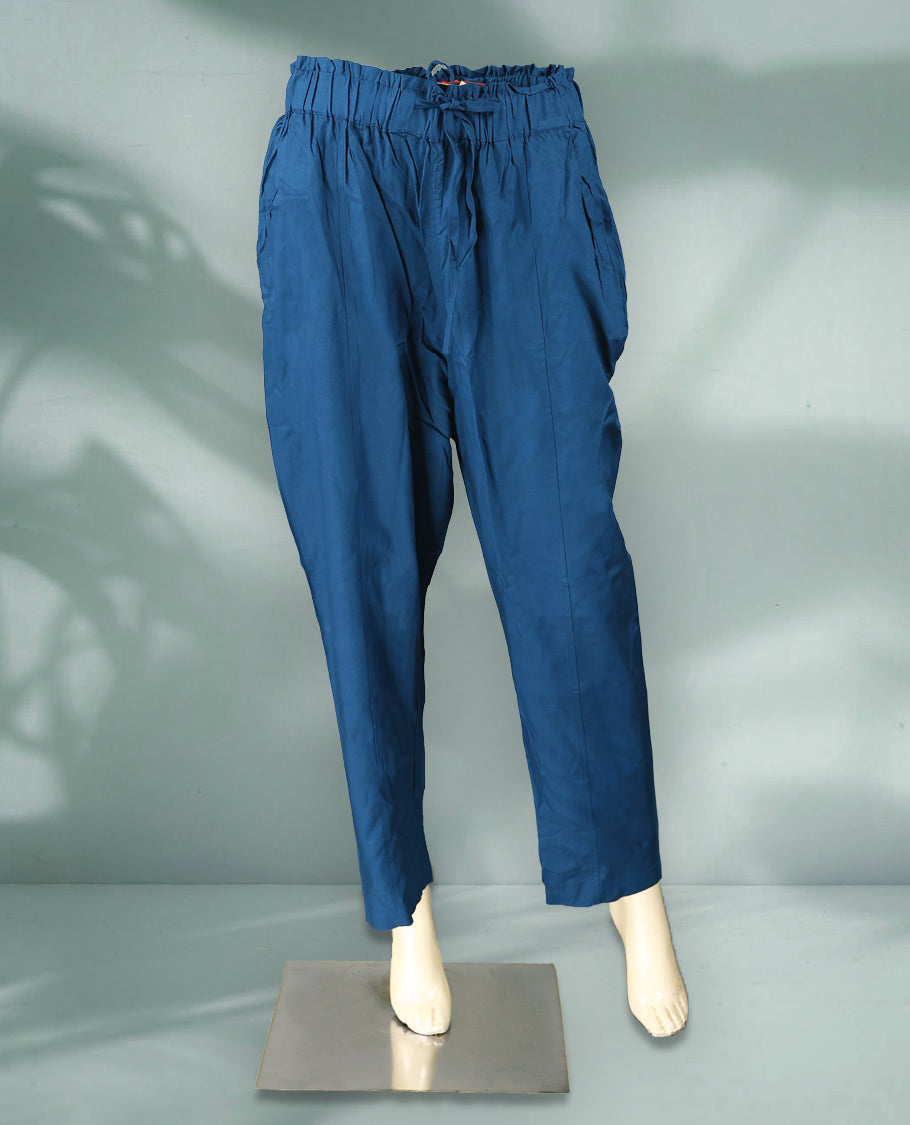 Blue colour women's pants feature a relaxed, ankle length design with an elasticated drawstring waistband and pleated detailing