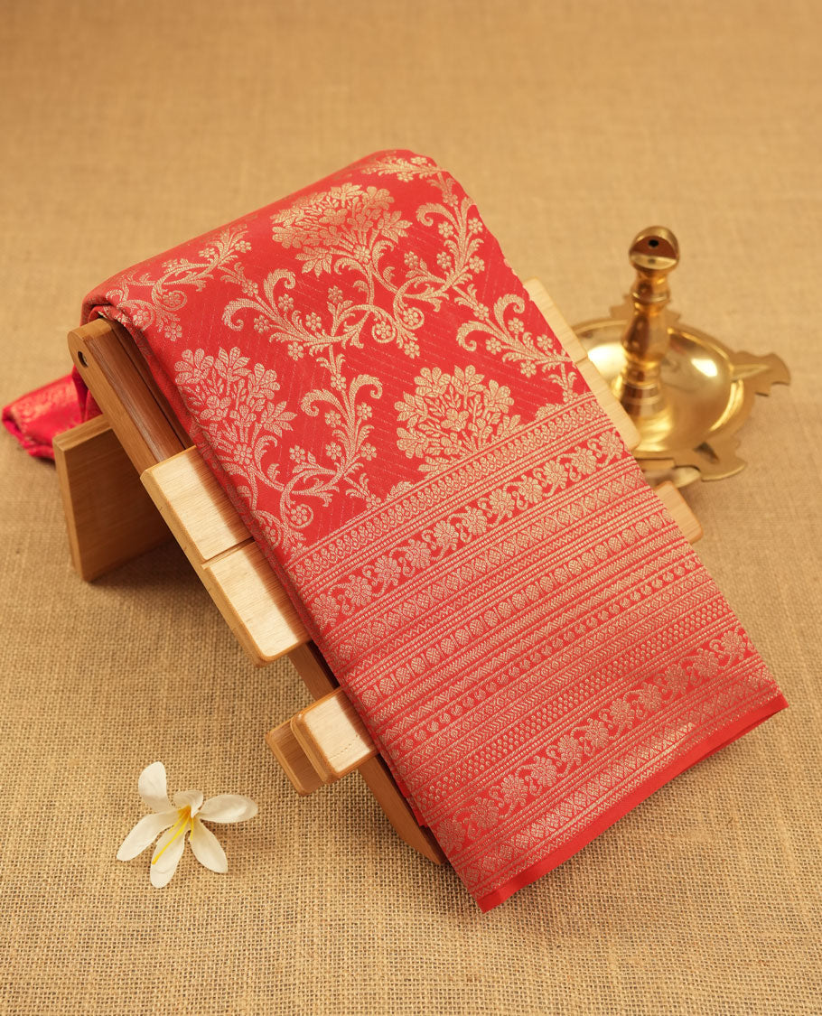 Red rose colour Kanchipuram pattern Manthrakodi saree with antique zari floral design, with brocade design & self zari pallu, elegant zari border, and zari jacquard blouse piece.
