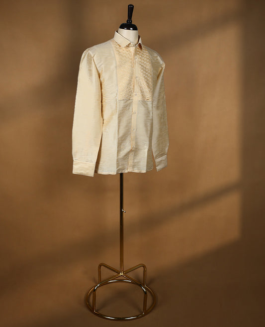 Cream ivory DH men's semi silk wedding shirt with a glossy finish, featuring intricate diamond jacquard pleats on the front panel, full sleeves, classic collar, and a chest pocket.
