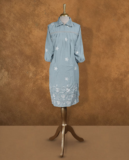 Dusty blue embroidered nightwear kurti with white floral thread work, crochet-detailed shirt collar, front yoke gathers, and three-quarter sleeves with elasticated hem.