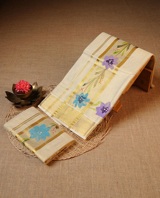 Cream colour Tissue silk set mund Featuring Elegant plain body, Complemented by Floral print with zari border.