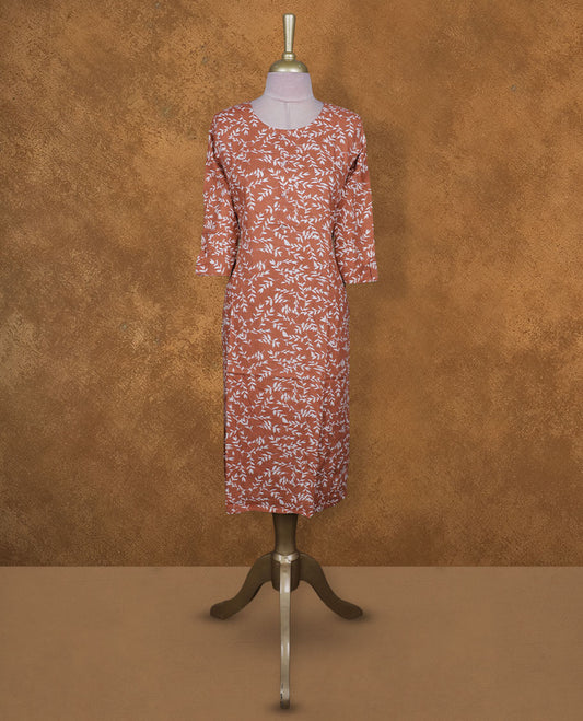 Brown and white colour kurti with White floral prints, knee length design, styled with a round neckline and a sleeve .