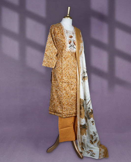 Deep Mustard and white colour salwar set featuring printed floral yoke and white dotted patterns on the kurta, paired with plain mustard bottom and a white dupatta with bold floral prints and mustard border.