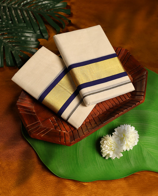 Off white colour cotton SET MUNDU featuring a plain body, complemented by a bold navy Blue and Gold toned border ( 2.00/2.80 MTS ).