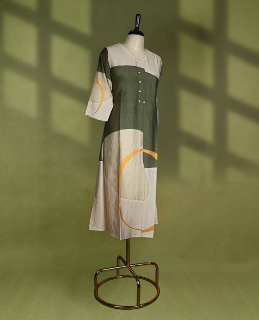 Contemporary printed kurti featuring a soft V-neckline, three-quarter sleeves, and a front button detail, adorned with abstract geometric patterns in earthy tones