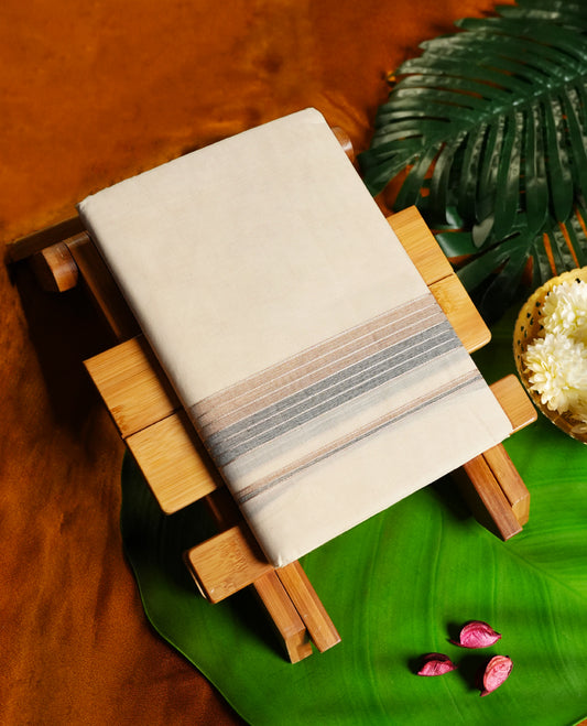 Off white colour cotton single dhoti featuring a refined light brown and grey kara with layered line detailing & Designed for daily comfort and traditional grace, ideal for rituals, cultural events, and festive wear.