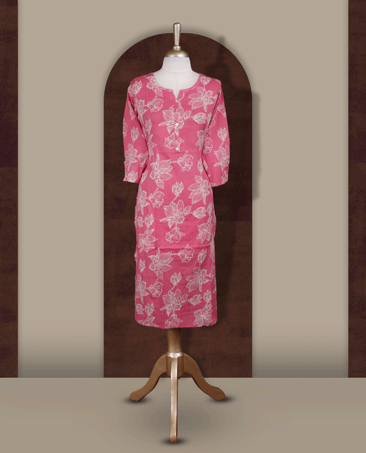 Soft pink colour kurthi adorned with delicate beige colour floral prints, featuring a stylish V notch round neckline and comfy 3/4th sleeves.