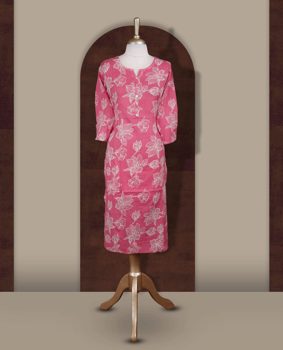 Soft pink colour kurthi adorned with delicate beige colour floral prints, featuring a stylish V notch round neckline and comfy 3/4th sleeves.
