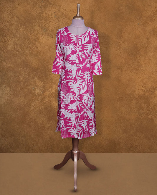 Pink colour kurti with White floral prints, knee length design, styled with a round neckline and a sleeve .