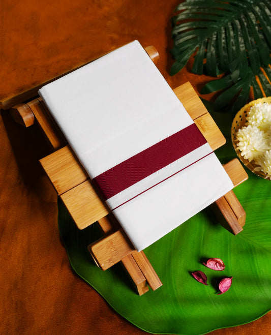 white colour cotton dhoti with a rich maroon border, Crafted for comfort and tradition, perfect for festivals, rituals, or special occasions & A bold yet classic addition to your ethnic collection.