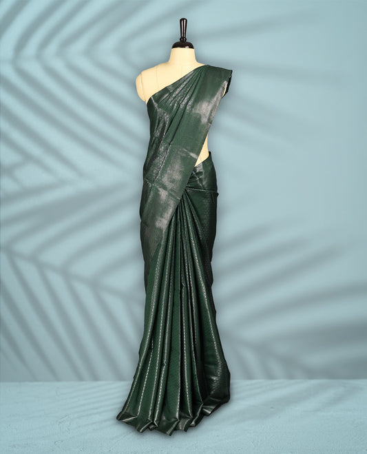 Deep Green Colour semi silk saree featuring an intricate Zari  motif weave across the body, paired with a zari worked border with matching blouse.