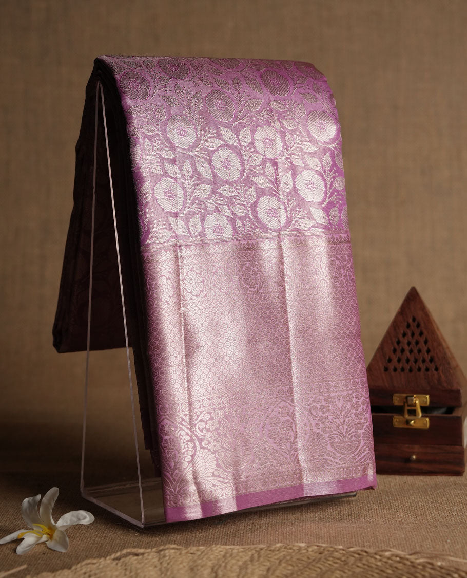 Pink colour and Antique silver Zari Tissue Brocade Saree features intricate floral Motifs on body and fancy border & pallu with floral patterns, paired with matching blouse