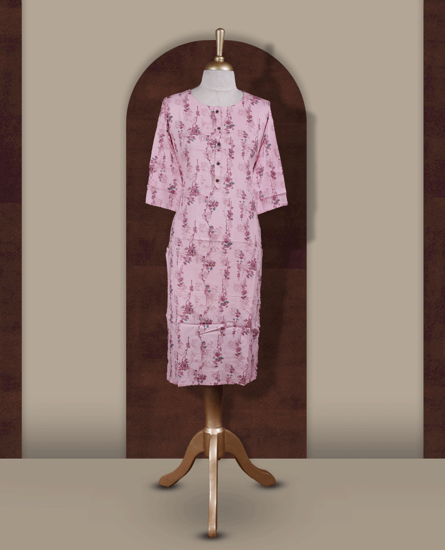 Baby pink colour kurti from TWARA, featuring with delicate floral prints and front button detailing & Designed with a round neckline and three quarter sleeves.