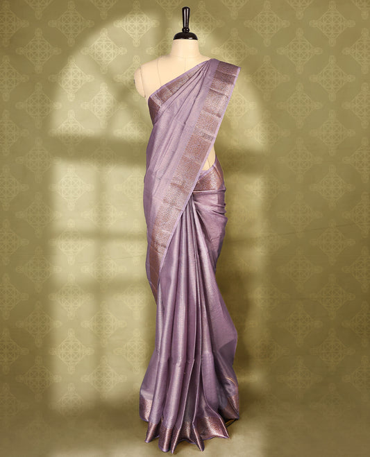 Pastel purple colour pure Banaras tussar silk saree with light gold zari small checked body, Self colour border featuring copper and silver antique zari traditional work, antique zari brocade pallu, with matching blouse.