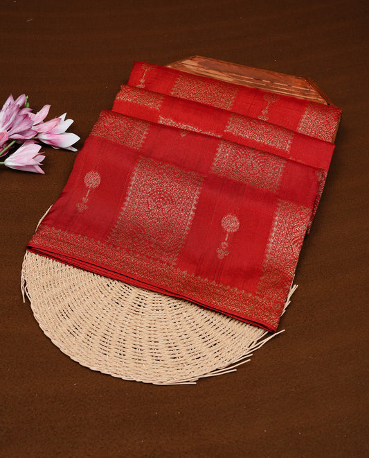 Red colour Tussar Banaras Georgette silk saree featuring Antique zari Box Pattern on body, complemented by self colour border with zari border, paired with matching blouse piece.