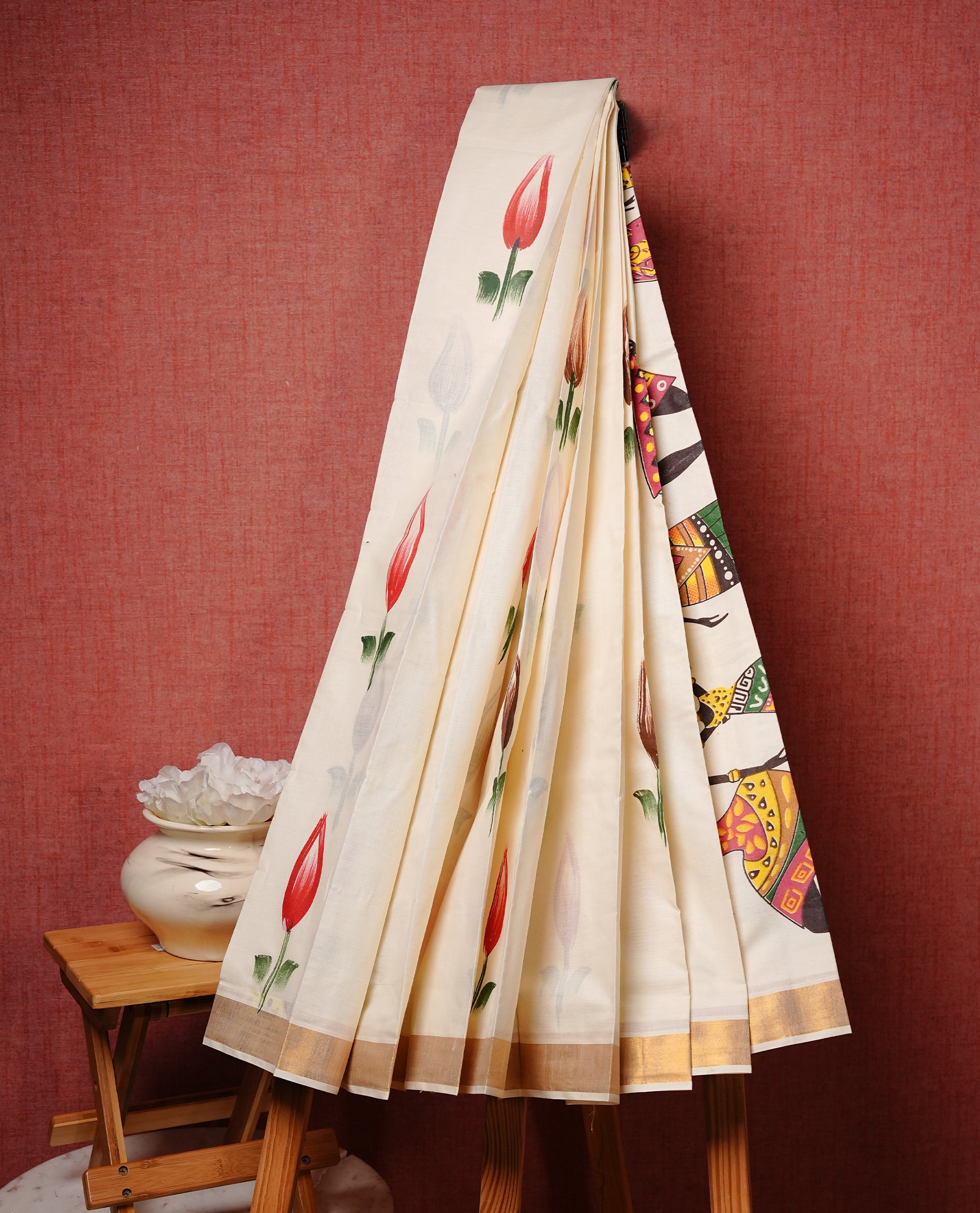 Cream colour Semi silk saree Featuring floral print on body, complemented by Self colour with gold zari border, paired with matching blouse piece.