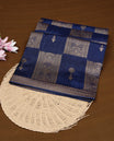Navy Blue colour Tussar Banaras Georgette silk saree featuring Antique zari Box Pattern on body, complemented by self colour border with zari border, paired with matching blouse piece.