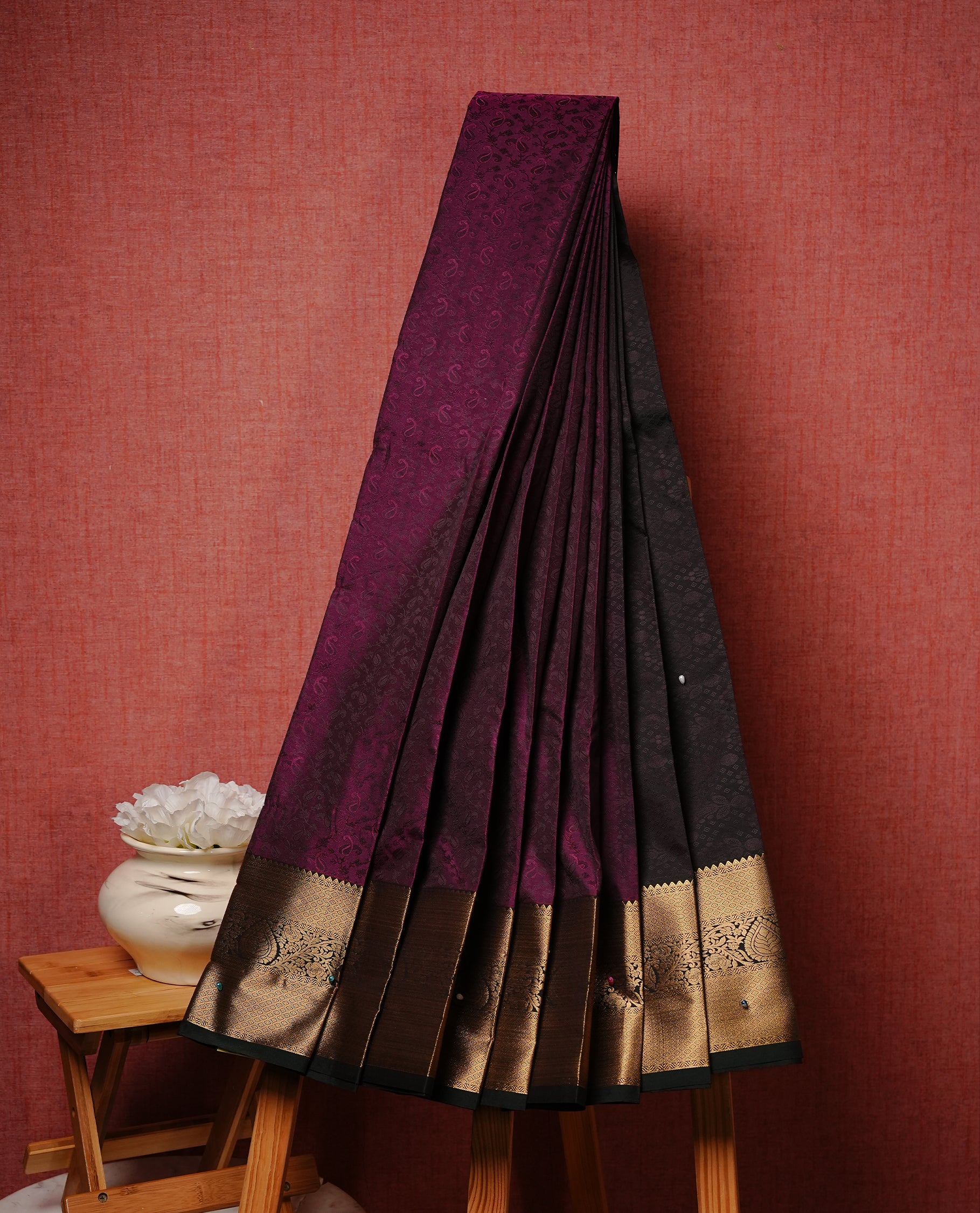 Purple colour Semi silk saree Featuring self colour zari motifs on body, complemented by contrast Green colour with gold zari border, paired with matching blouse piece.