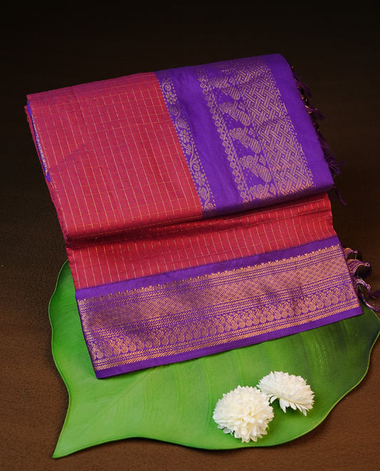 Maroon colour kalyani cotton saree featuring gold zari check pattern on body, complemented by Violet colour with Antique zari border, paired with matching blouse piece.