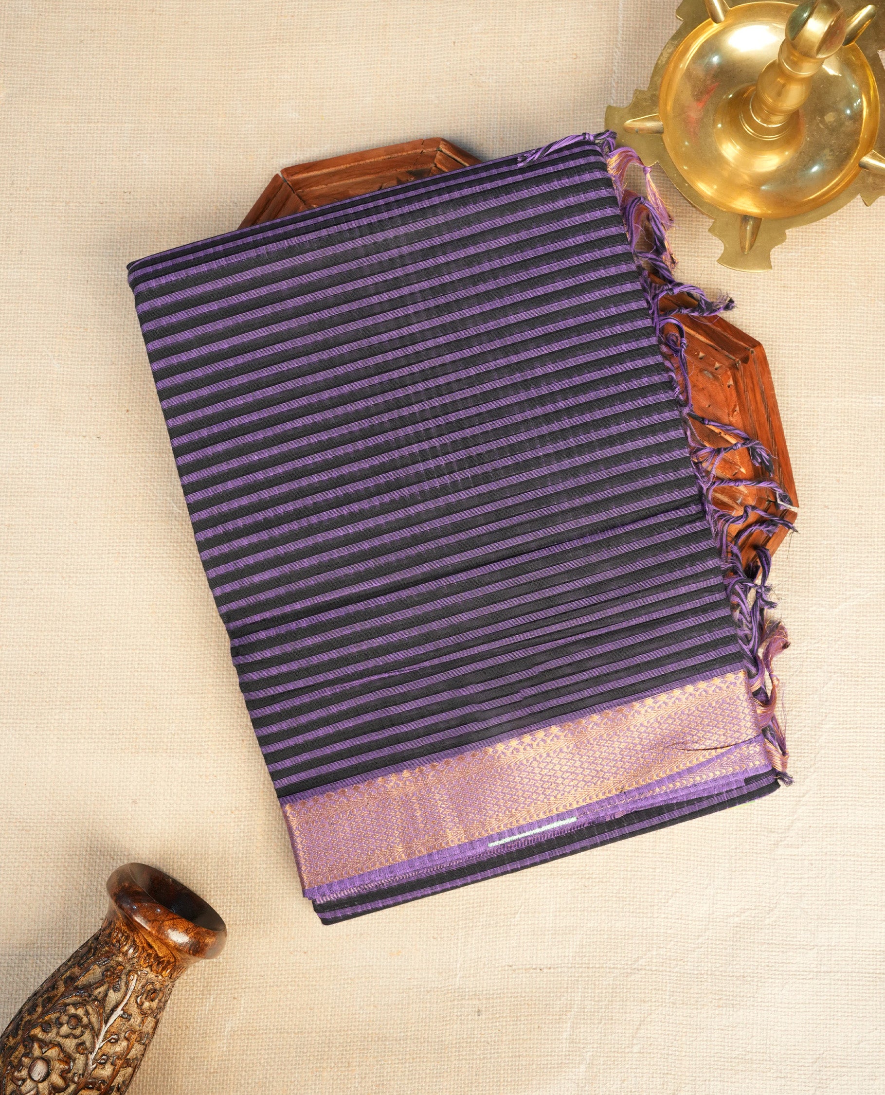 Violet  Colour Mangalagiri cotton saree featuring elegant Black stripes Across The Body , a Two Inch Gold  zari border & Gold Zari Pallu, Paired With a matching blouse piece.