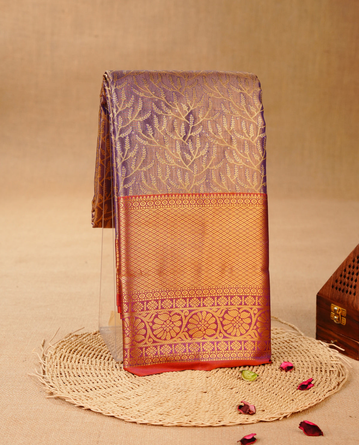 Violet & Gold colour Double shade Semi tissue silk saree featuring self color Floral pattern on body, Contrast Brick red colour with Fancy border, paired with matching.