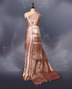 Pastel Onion colour Pure tissue Banaras saree featuring intricate silver zari weaving all over with a rich pallu and bold paisley motifs, offering a luxurious drape perfect for weddings, festive occasions, and grand celebrations