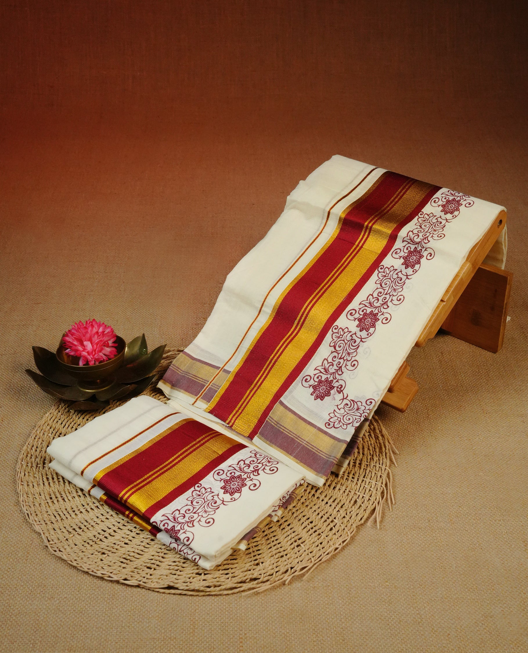 Cream colour Cotton set mundu With plain body, enhance gold zari with Maroon Floral print kara.