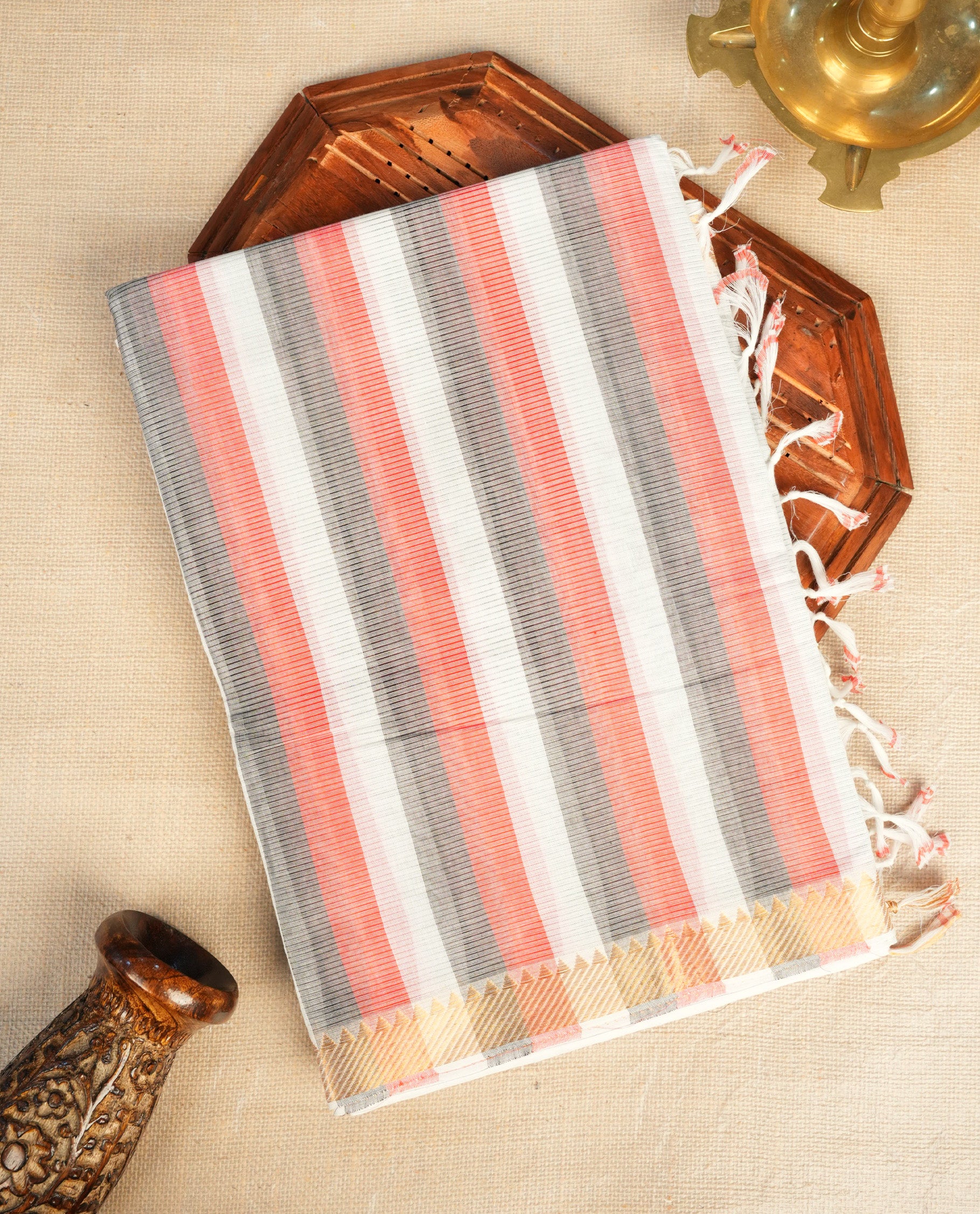Black,White & Red Colour Mangalagiri Cotton Featuring Contrast stripes On Body, Complemented By Gold Zari border & Contrast Pallu ,Paired With Matching Blouse Piece.