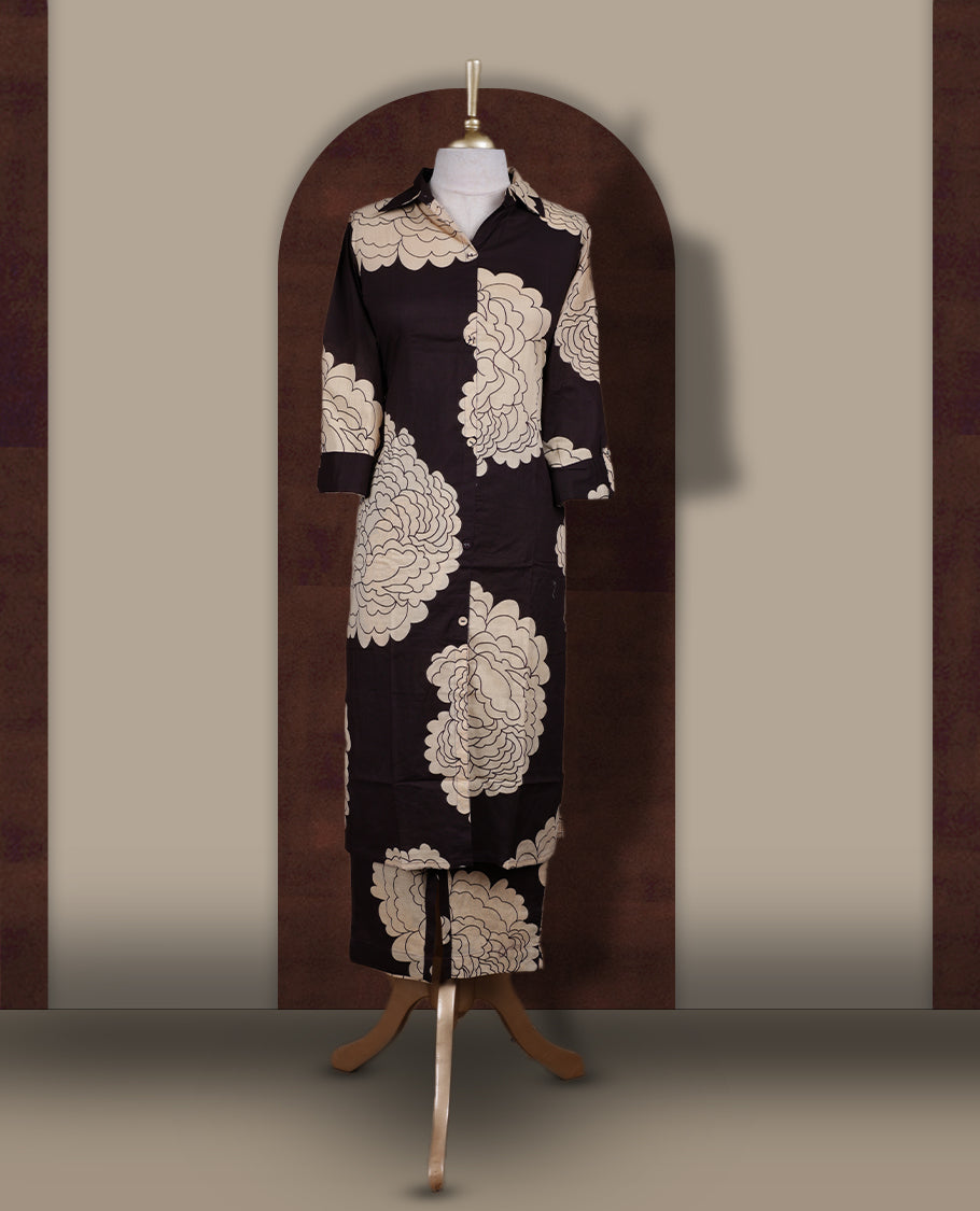 Dark coffee brown colour cotton coord set featuring charming bold cream colour floral prints all over, Designed with a classic shirt collar and 3/4 sleeves, paired with matching straight pants for a trendy, relaxed, and comfy everyday look.