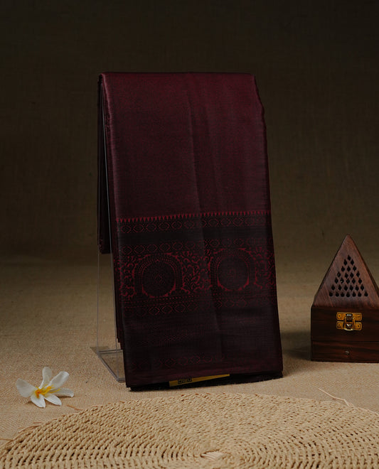 Dark Chocolate brown Tissue silk saree featuring Elgant Plain body, enhance with black traditional zari border, paired with matching blouse piece.
