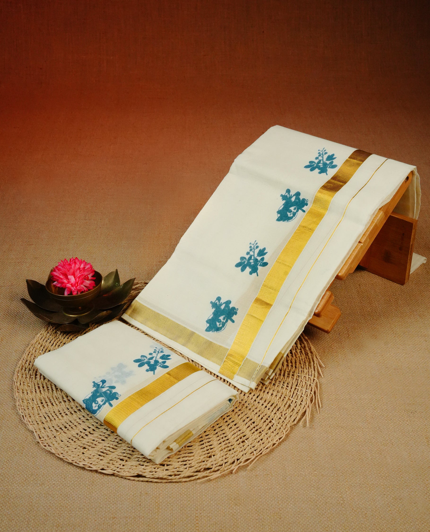 Cream colour cotton Set Mundu With Plain body, enhanced with Gold kasavu & Blue Krishnan Print kara.