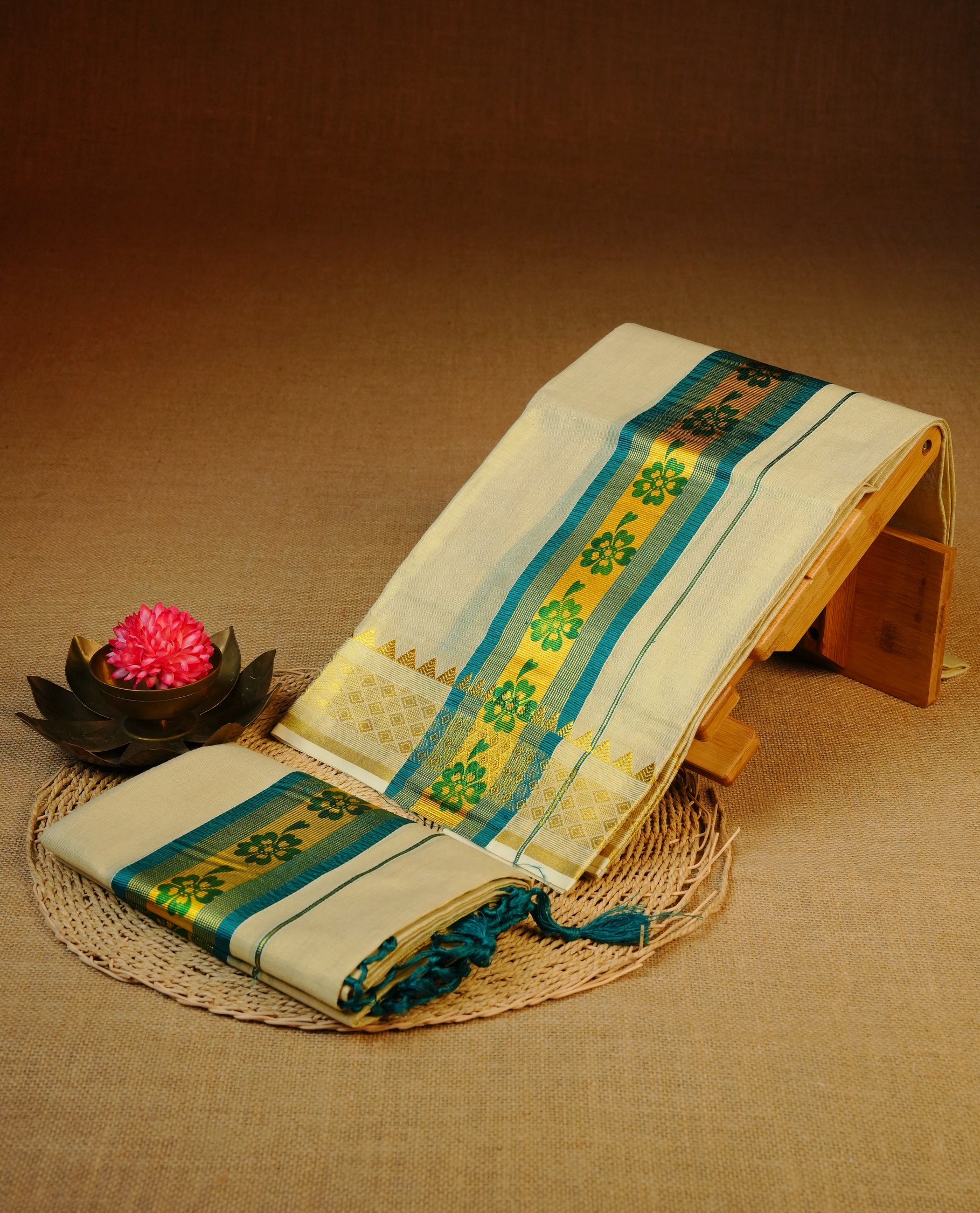 Light gold tissue set mundu featuring Teal colour print on kasav kara.