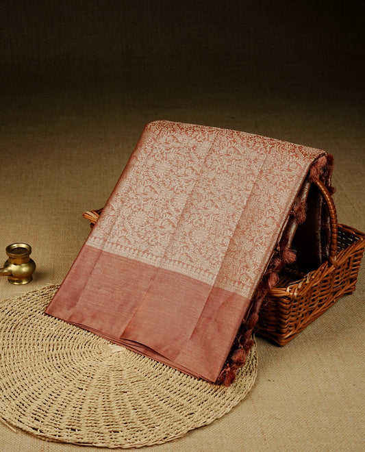 Bronze Colour banaras saree featuring Light gold zari Floral kodi pattern on body, complemented by borderless finish, comes with matching blouse piece.