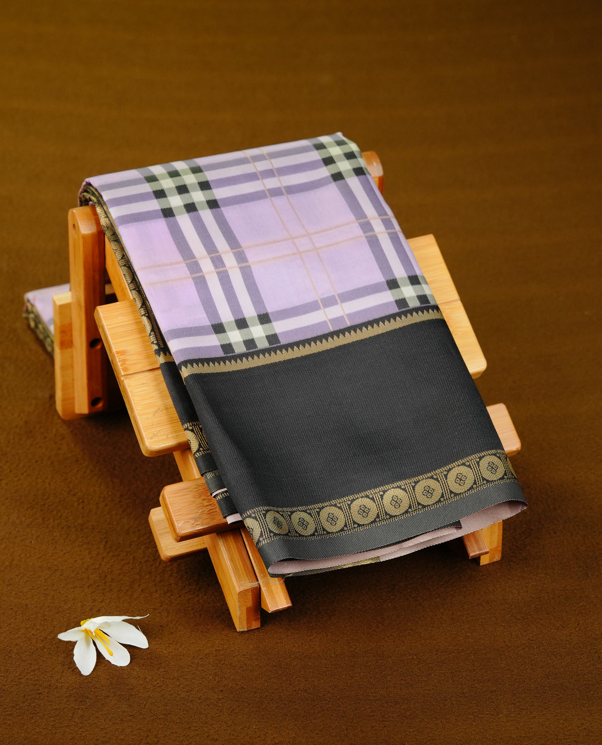 Lavender colour soft silk saree with contrast Black border.