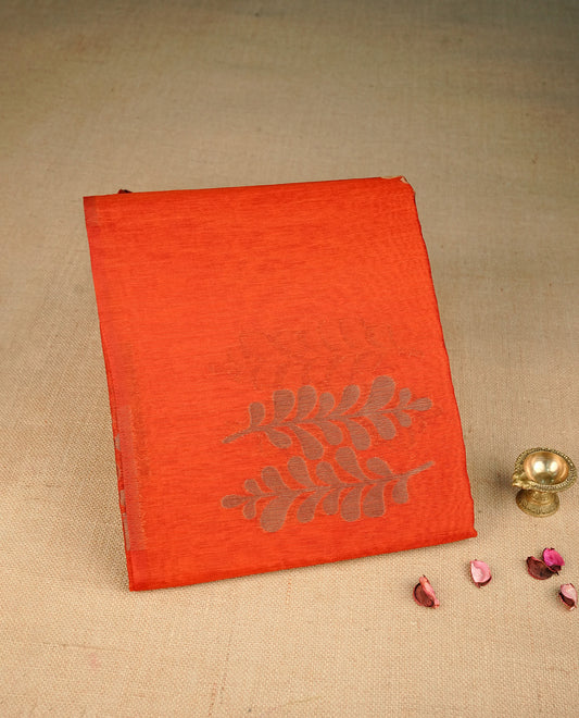 Brick red colour semi silk saree featuring Gold zari Leaf pattern on body, complemented by contrast  colour with Gold zari border, comes with matching blouse piece.