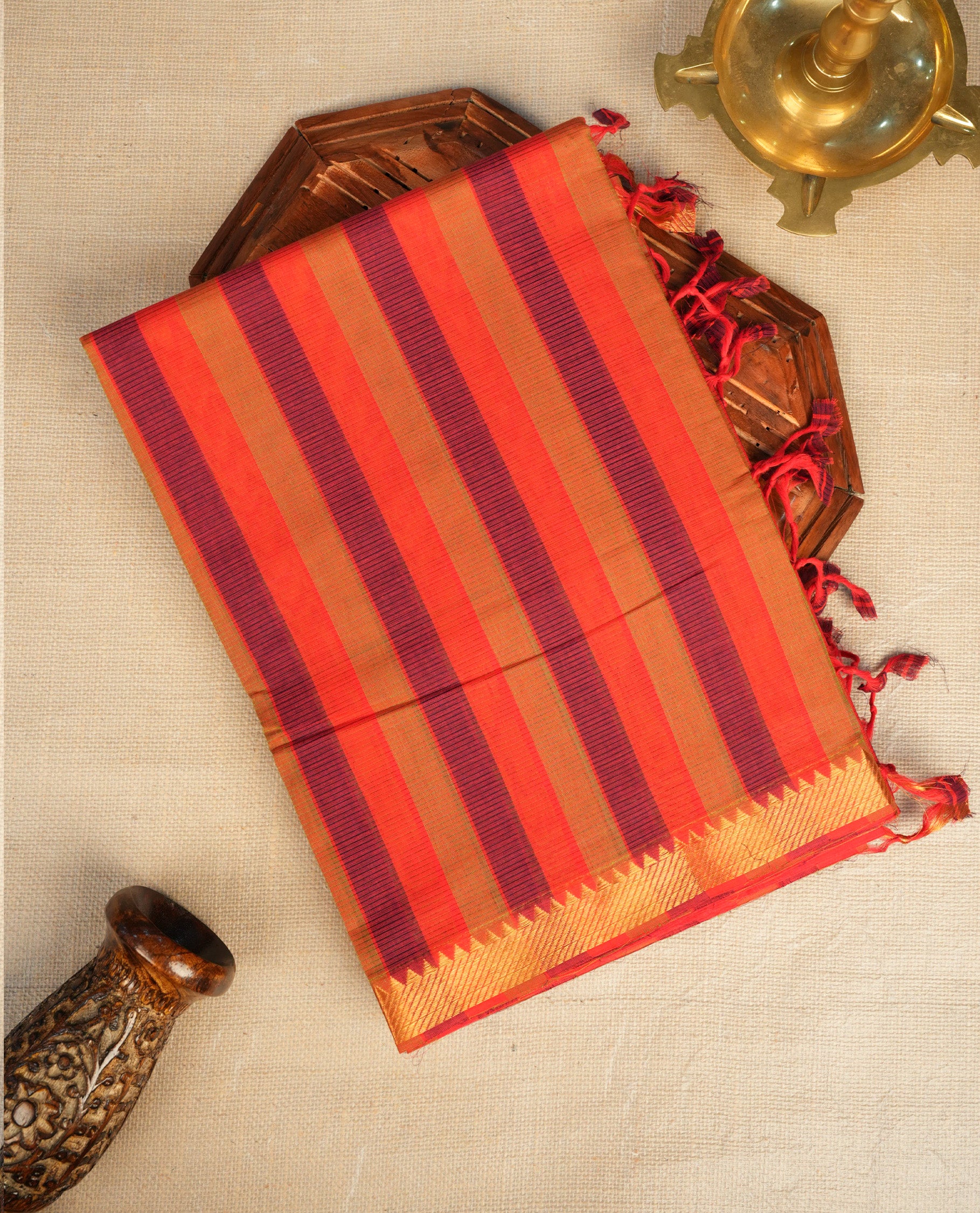 Purple, Dark Gold & Red Colour Mangalagiri Cotton Featuring Contrast stripes On Body ,Complemented By Gold Zari border & Contrast Pallu ,Paired With Matching Blouse Piece.