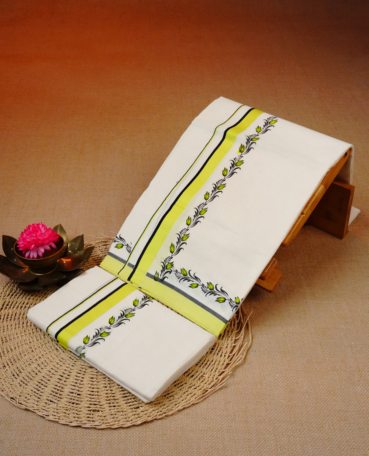 Cream colour Cotton set mundu featuring Black & Yellow kara with Floral kodi printed border