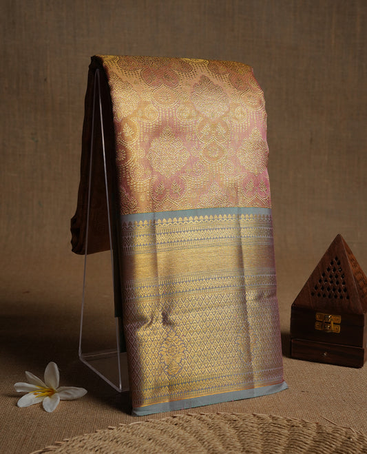 Pink & gold double shade colour kancheepuram tissue silk saree highlighting gold zari pattern body, with contrast powder blue colour colour with traditional border and paired with matching blouse.