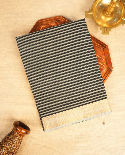 Black  Colour Mangalagiri cotton saree featuring elegant Grey stripes Across The Body , a Two Inch Gold  zari border & Gold Zari Pallu, Paired With a matching blouse piece.