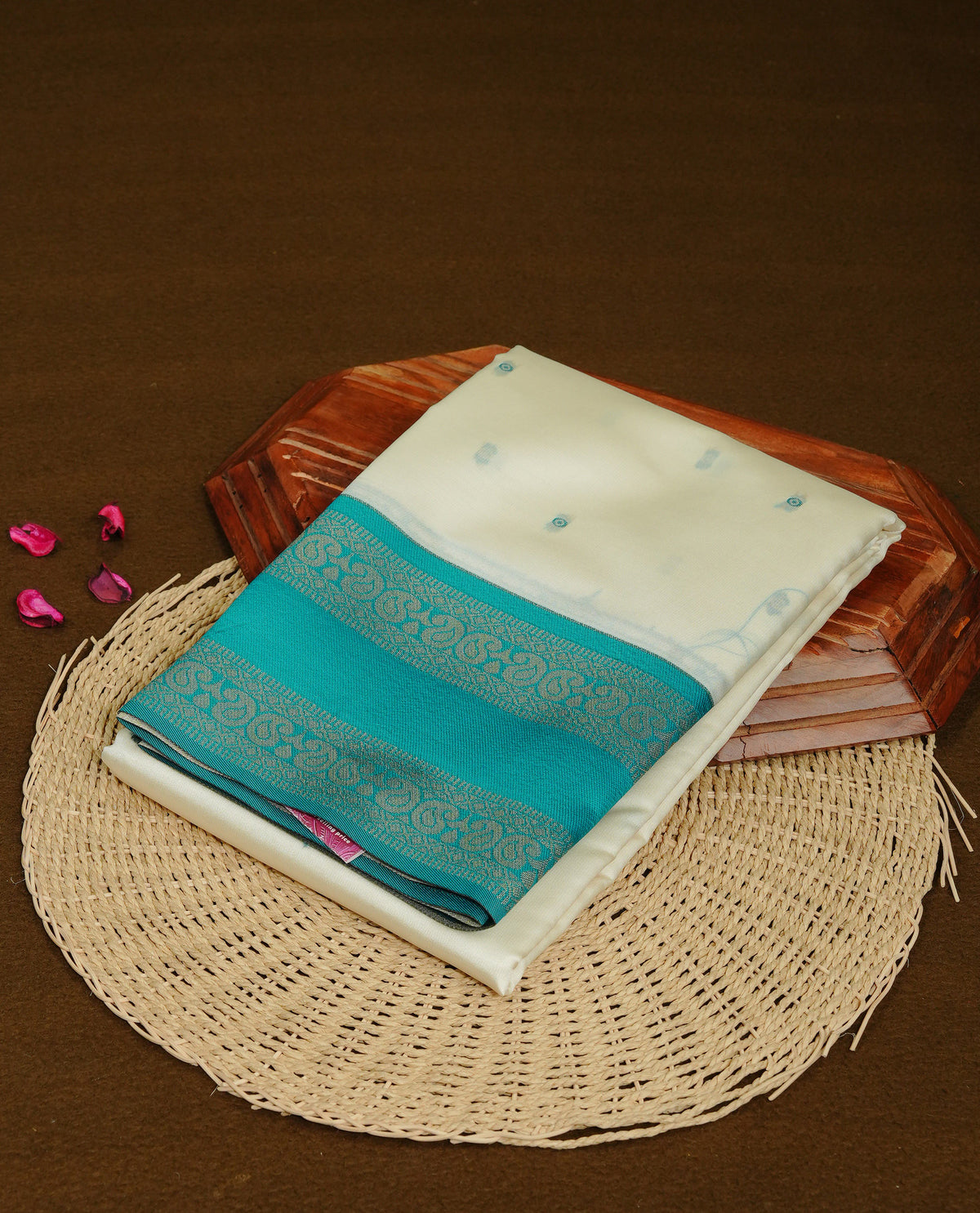 Off White  Colour Semi Silk Saree Featuring  Teal thread buttas On Body, Highlighted  by contrast border with Mango motifs, paired with matching blouse piece.