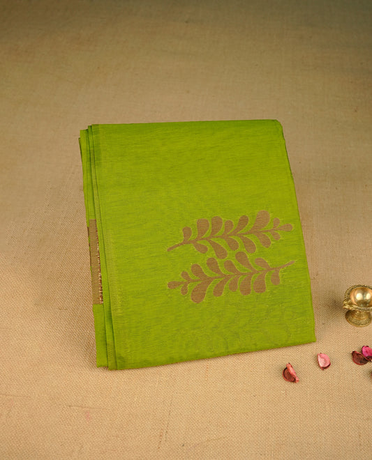 Green colour semi silk saree featuring Gold zari Leaf pattern on body, complemented by contrast colour with Gold zari border, comes with matching blouse piece.