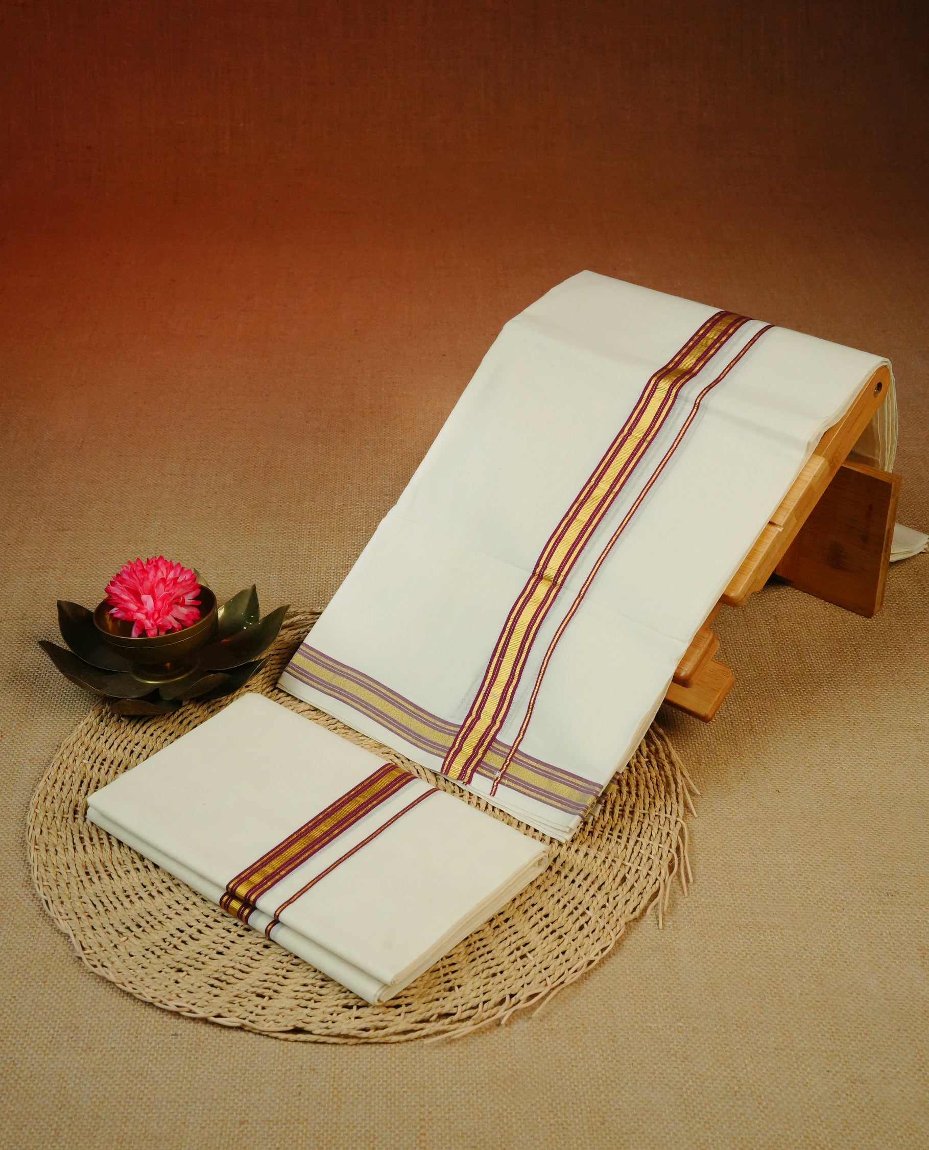 Cream colour cotton Set Mundu With Plain body, enhanced With Maroon & gold zari kara.