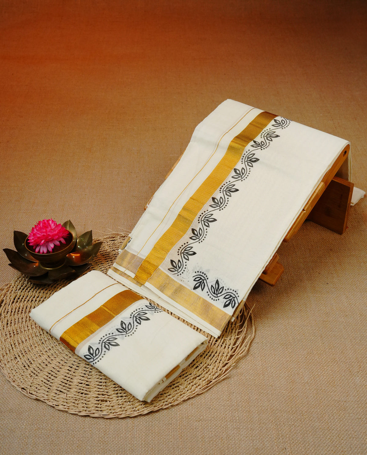 Cream colour cotton set mundu featuring simple Kasav with Black colour kodi print.