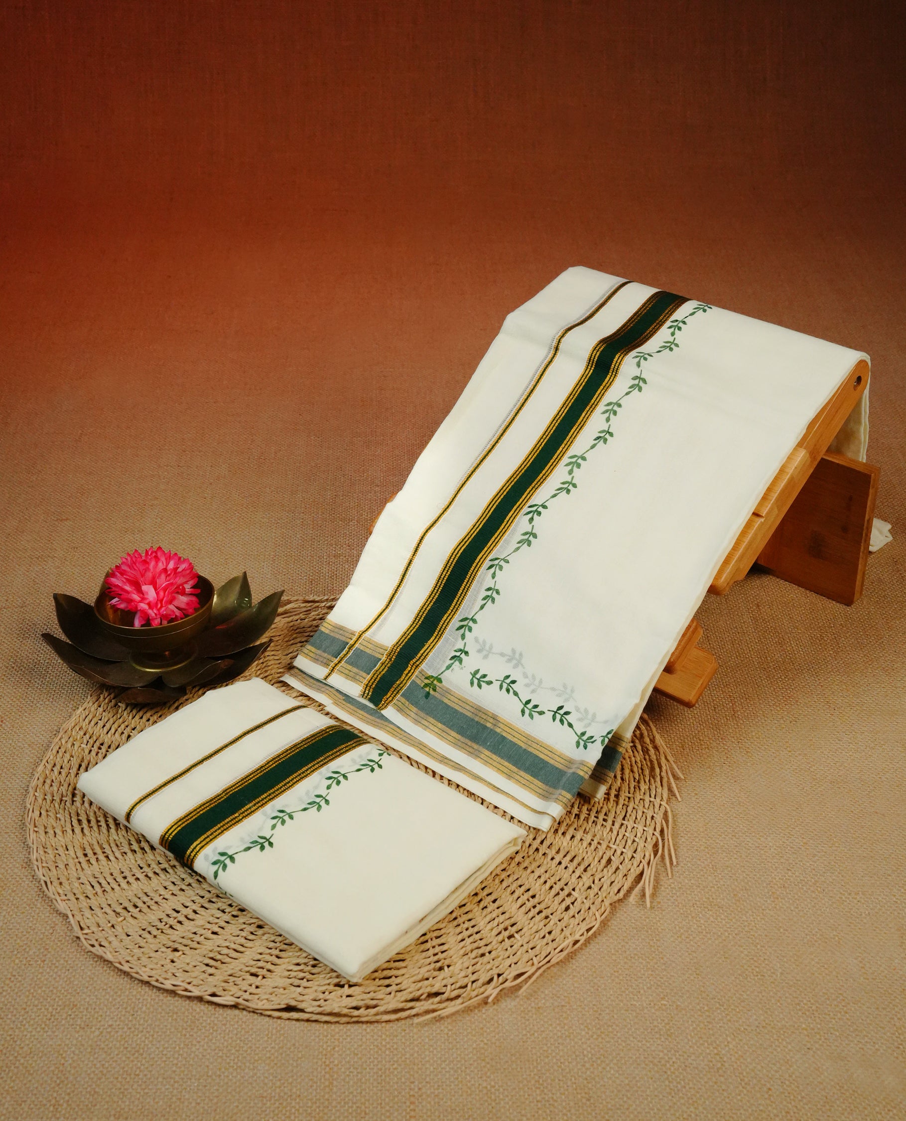 Cream colour cotton Set Mundu With Plain body, enhanced with Gold kasavu with Printed & green kara.