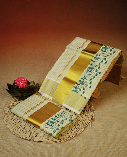 Cream  Colour tissue set mundu featuring a subtle striped body, enhanced with elegant green lotus and foliage motifs & a rich gold zari kara