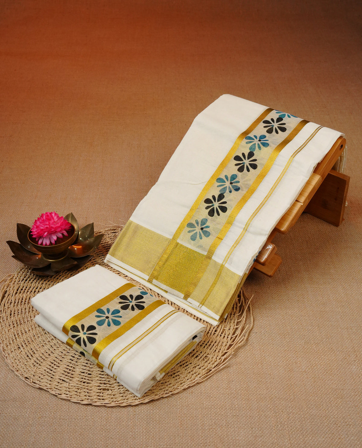 Cream colour cotton set mundu featuring kasav with black & green printed kara.
